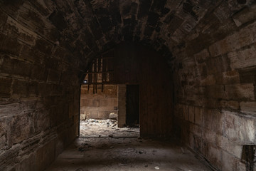 Mystical interior of dark corridor in an old abandoned palace