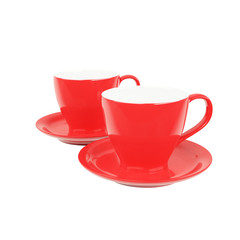 Red porcelain cup and saucer on a gray background, cup for drinks, tea and coffee, mockup for advertising and design. 3d illustration.