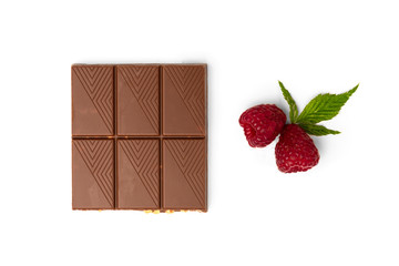 Chocolate with raspberry isolated on white background.