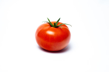 Fresh red tomato vegetable isolated on white