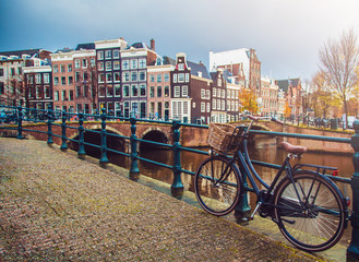 Bicycle parked on a bridge in Amsterdam, Netherlands