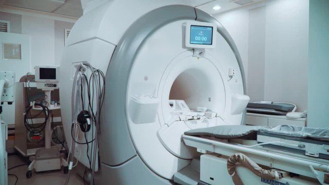Room with white magnetic resonance tomograph for examination