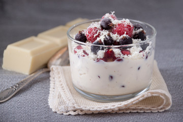 Dessert with cottage cheese, yogurt, oatmeal, berries and white chocolate