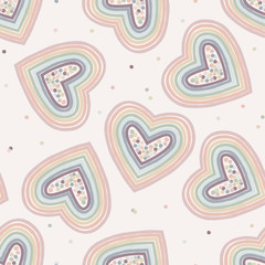 Vector seamless pattern with rainbow heart and polka dots. Creative scandinavian childish background for Valentine's Day. Cute colourful hearty backdrop for wrapping paper, textile, fabric, card