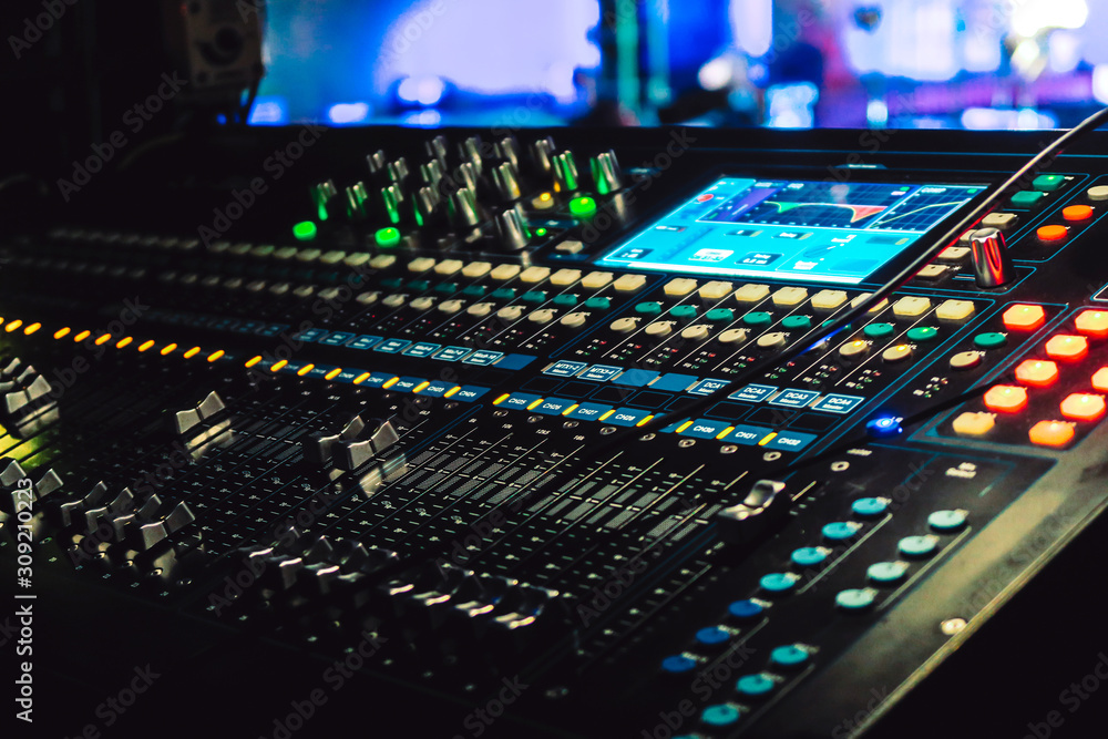 Wall mural Closeup of an audio mixing control panel