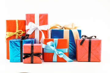 Big pile of colorful wrapped gift boxes isolated on white background. Mountain gifts. Beautiful present box with overwhelming bow. Christmas surprise icon. Happy new year decor, discounts, promotions.