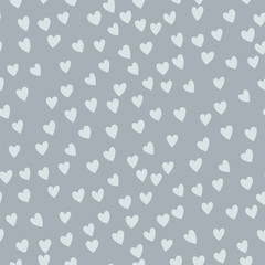 Vector seamless pattern with little hearts. Creative scandinavian childish background for Valentine's Day. Neutral hearty backdrop for wrapping paper, textile, fabric, card making.
