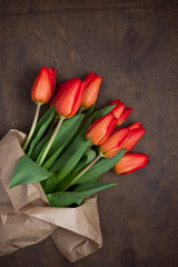 Flower bouquet of colorful  tulips on  wooden table. Spring background for  International Women's Day, Mother Day or Birthday 