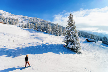 Man on Snowboard in Zillertal Arena ski resort in Austria