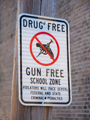 Drug Free and Gun Free School Zone sign in New Orleans, Louisiana, USA.