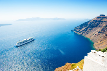 Santorini island, Greece. Cruise ship near the coast. Summer holidays, travel destinations concept