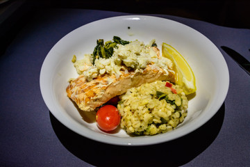 Plate with grilled salmon and risoto