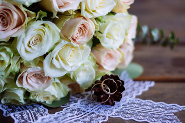 wedding bouquet of flowers in the hands of the bride