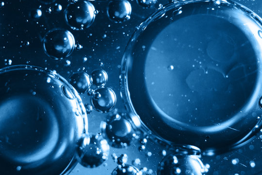 background texture water drops macro concept. design, paint. Planets, universe, space, constellation. atoms, molecules, physics. Fresh classic Pantone 2020 in blue. Color concept of the year.