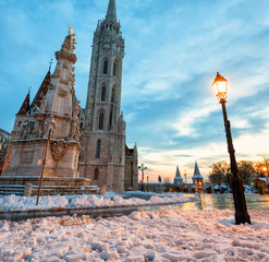  St. Matthias Church on a winter morning in Budapest, snow-covered winter streets