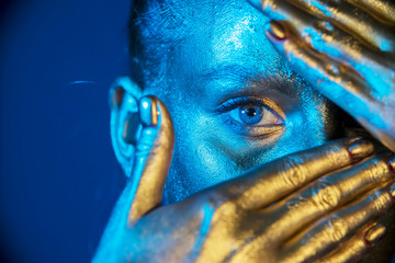 Close-up silver portrait of a woman with glitter make-up