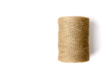 Fototapeta na wymiar Spool of thread. Twine. Threads in a skein. Hard threads. Twine for work. Threads for working moments.