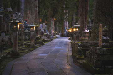 Ancient Cemetery at night inside a forrest, Okunoin Cemetery, Wakayama, Japan.