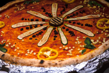 big pizza on a plate