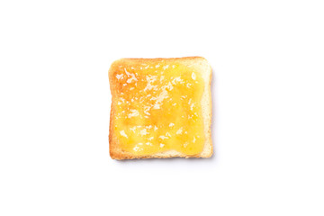 Toast with orange jam isolated on white background