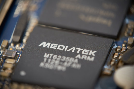 SARANSK, RUSSIA - DECEMBER 10, 2019: Mediatek ARM MT6235BA chip on circuit board. Shallow deep of field photo.