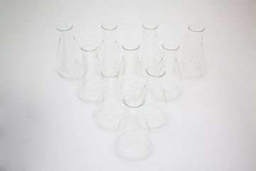 Group of scientific laboratory glass erlenmeyer flask isolated on white background