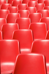 Naklejka premium Red plastic chairs