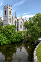 Fototapeta na wymiar Saint Vincent Convent of Mercy behind Corrib River, Galway Ireland