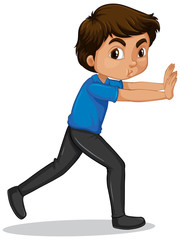 Boy in blue shirt pushing wall on white background