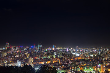 Fototapeta na wymiar 札幌市中心部の夜景 / 夏の北海道札幌市