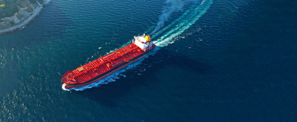 Aerial drone ultra wide panoramic photo of industrial crude oil tanker cruising open ocean deep blue sea - obrazy, fototapety, plakaty