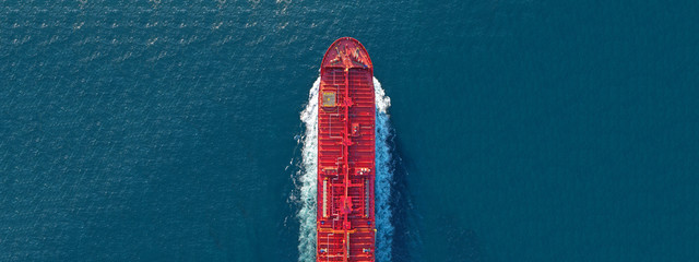 Aerial drone ultra wide panoramic photo of industrial fuel and petrochemical tanker cruising open...