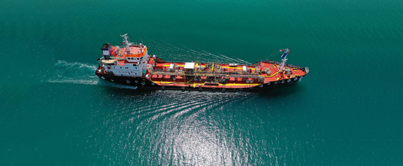 Aerial drone ultra wide panoramic photo of industrial fuel and petrochemical tanker cruising open...