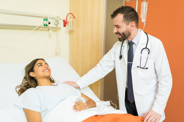 Obraz premium Doctor Comforting Patient At Hospital
