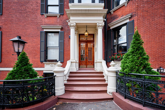 A view of a historic brownstone building in an iconic neighborhood of Manhattan, New York City