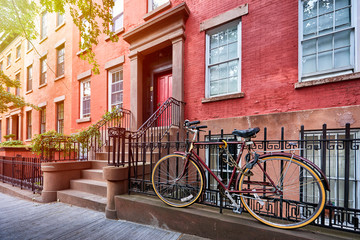 a view of a historic brownstone in an iconic neighborhood of Manhattan, New York City