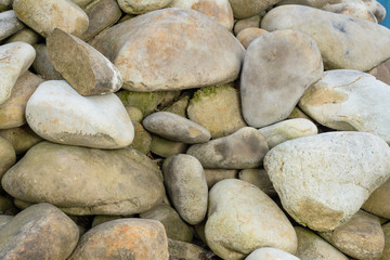 Big pile of gray stones, natural texture.