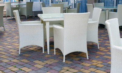 chairs and tables in the summer cafe