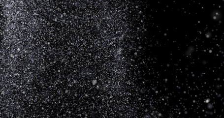 Obraz premium Natural white winter snowfall on a black background