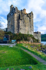 eilean donan castle road clouds sky