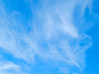 Blue sky with clouds and sun. blue sky