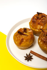 Homemade roasted apples on white background