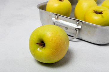 Fresh green apples on white background