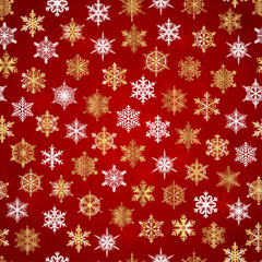 Seamless vector pattern with gold and white snowflakes on red background