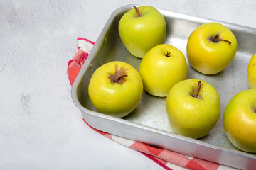 Fresh green apples on white background