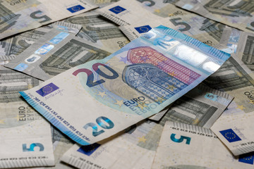 European money is in textures, denominations of 20 and 5 euros. 2019
