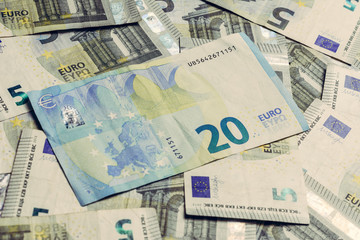 Fototapeta na wymiar European money is in textures, denominations of 20 and 5 euros. 2019