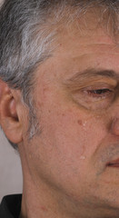 Obraz premium male tear on the cheek