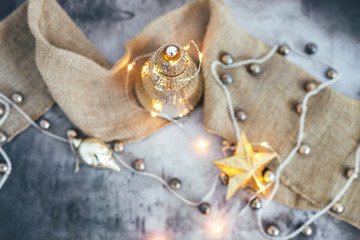 Gold mercury glass candle and tree with ornaments and garland