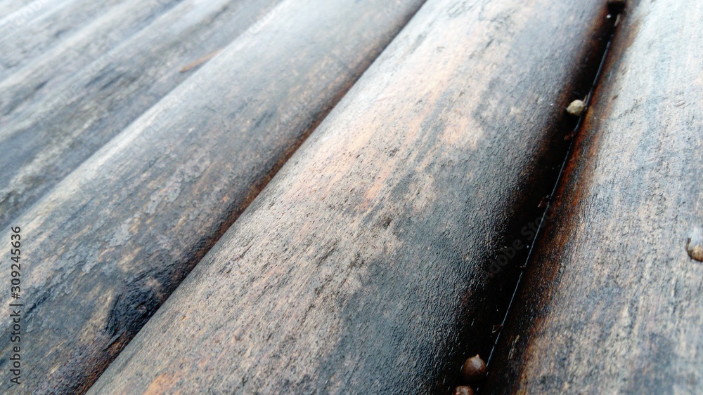 Poster the effect of moisture on wood. a construction log for use in construction without longitudinal sawi